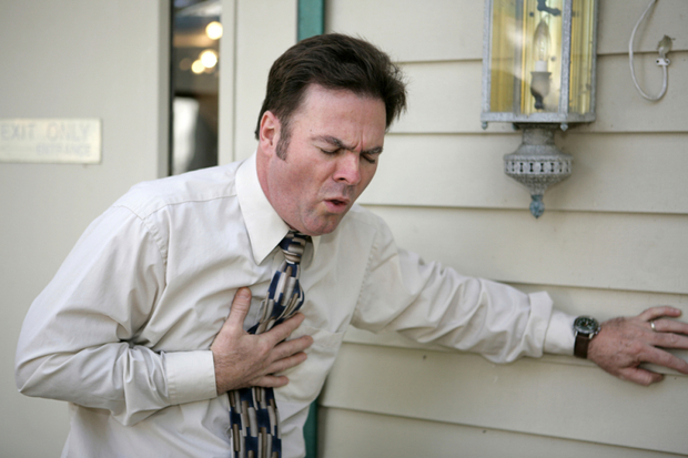 Man suffering chest tightness outside his house