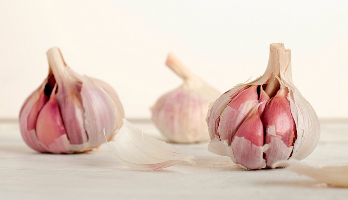 two bunches of garlic on display